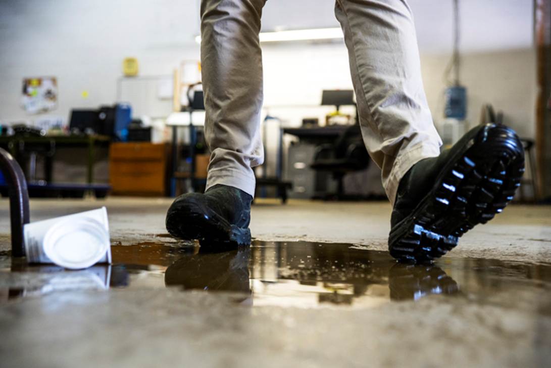 A person's legs in black shoes
AI-generated content may be incorrect.